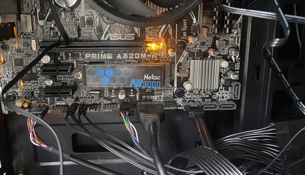 Yellow light glowing on a motherboard, symbolizing a diagnostic alert